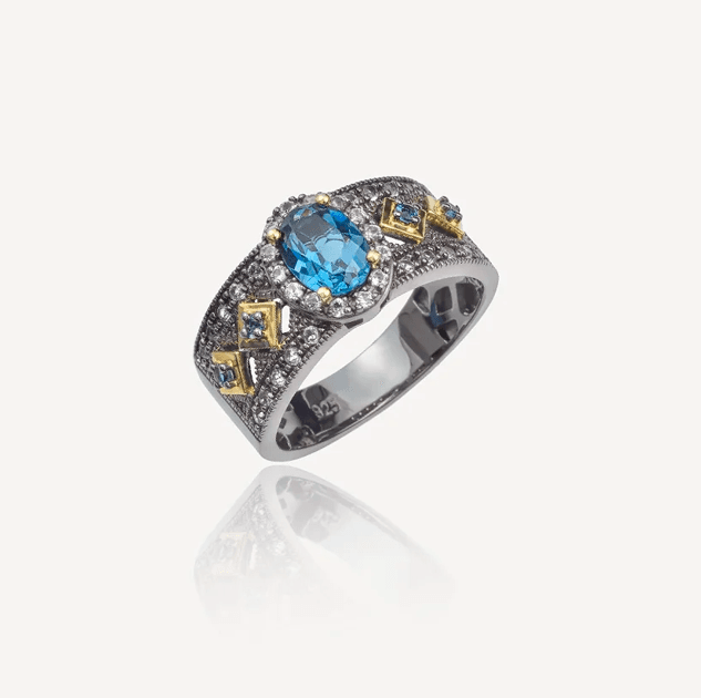 Кольцо из серебра 925 с топазами